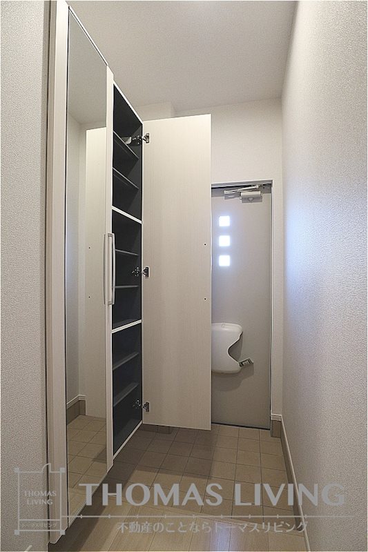 プレザント A棟 玄関